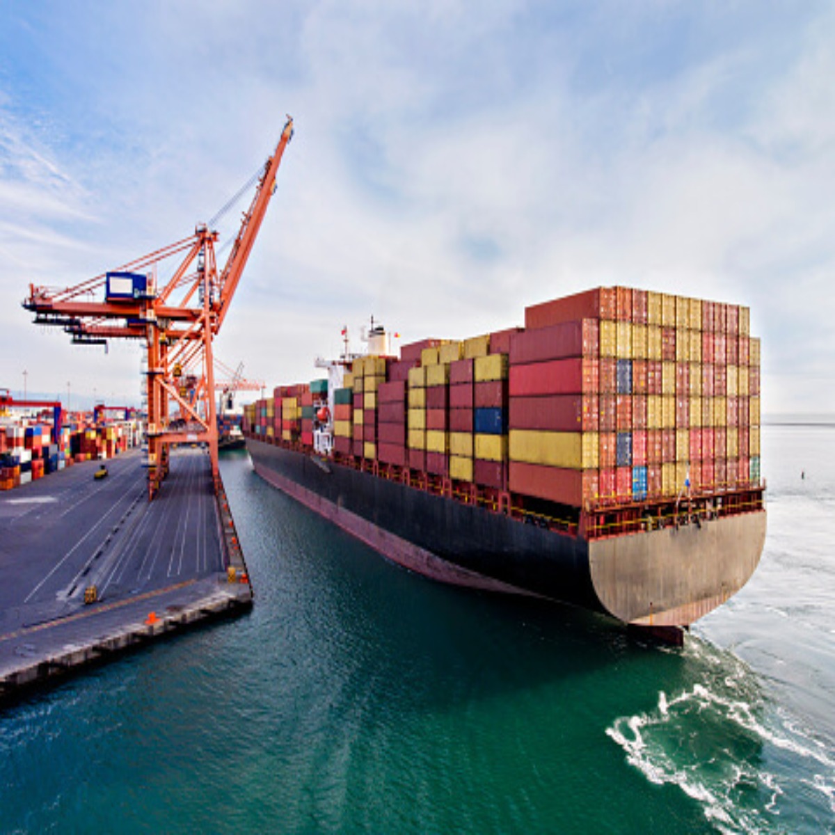a ship full of cargo and containers on the sea 